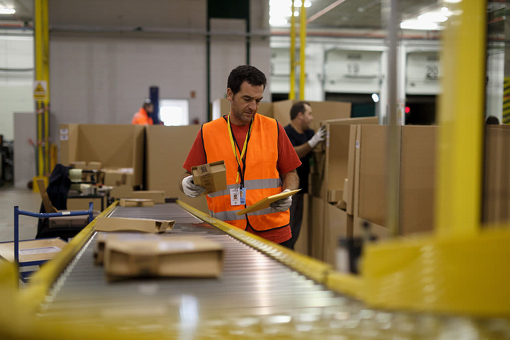 Amazon increases average pay for warehouse workers and adds free Prime membership perk