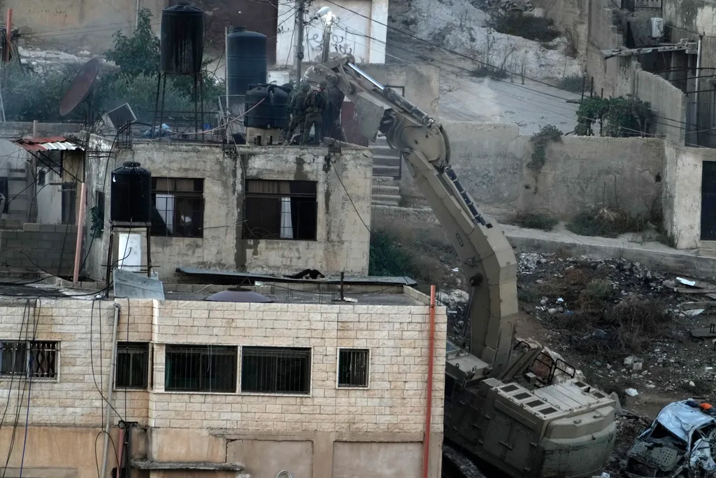 Israeli soldiers filmed pushing bodies off rooftop in deadly West Bank raid